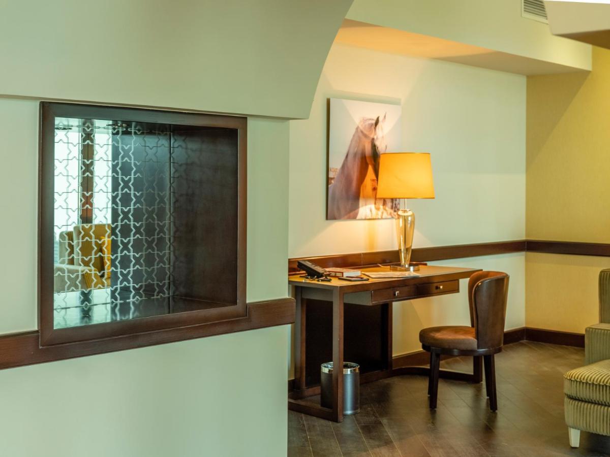 דוחה Retaj Salwa Resort & Spa מראה חיצוני תמונה A room at the Inn at the Opera